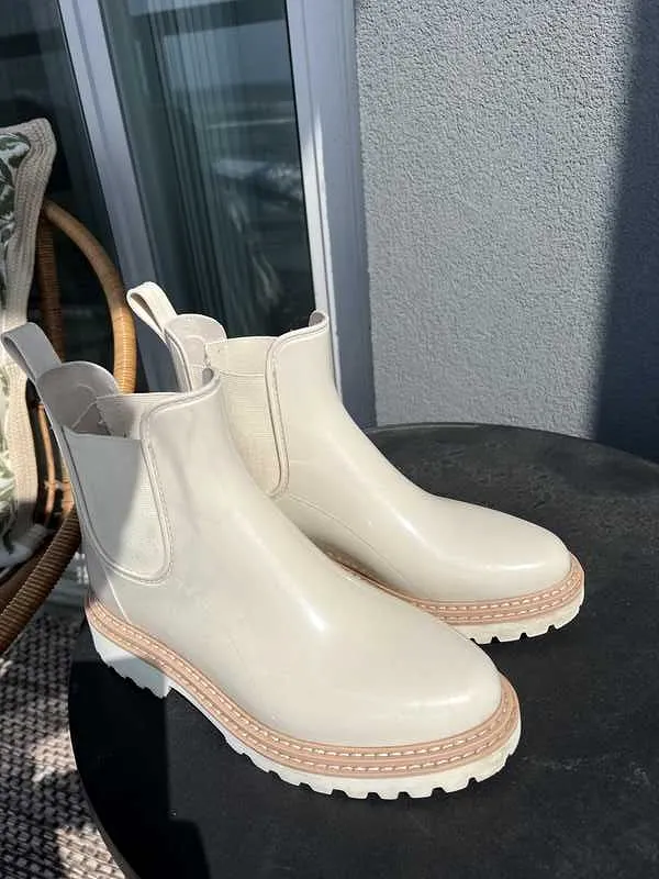 STORMY RAINBOOTS IN IVORY PATENT STELLA - re:vita